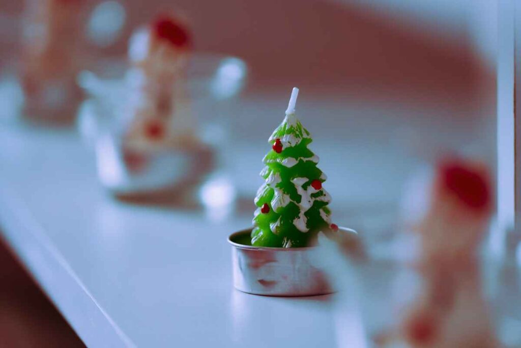 Close-up of a beautifully decorated small artificial Christmas tree.